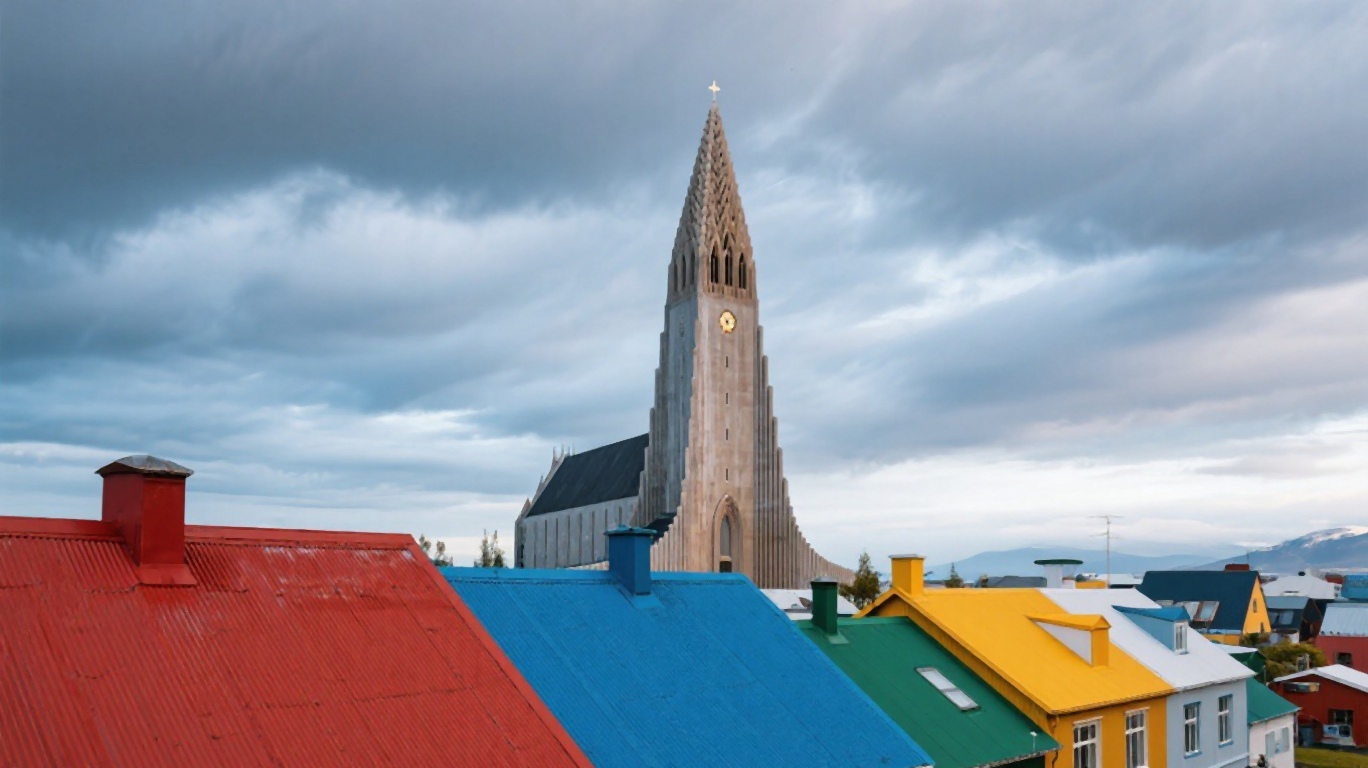 Hallgrimskirkja church towering over colourful Reykjavik rooftops